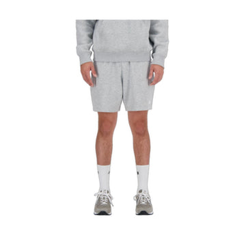 Pantaloni Corti Sportivi da Uomo New Balance ESSENTIALS FRENCH TERY SHORT 7 MS41520  Grigio